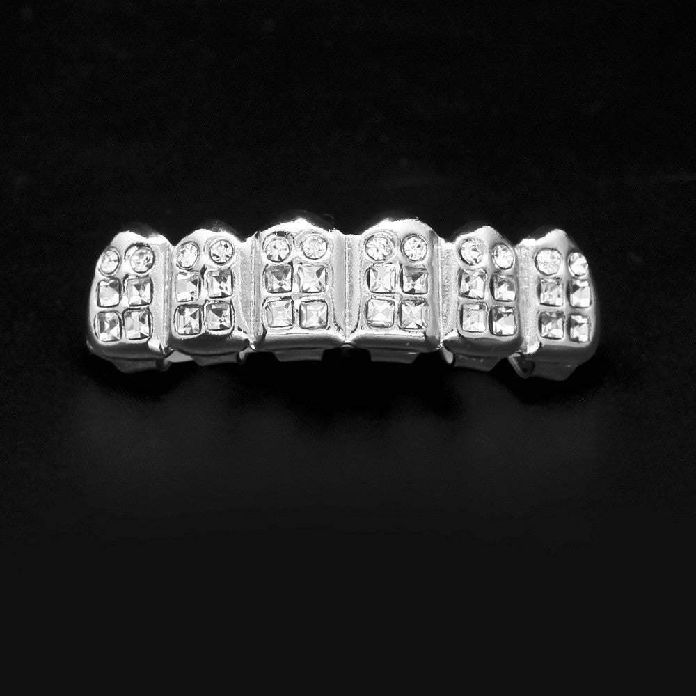 Hip-hop diamond-encrusted and gold-plated teeth grillz