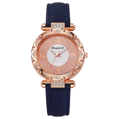 Korean-style quartz watch with a simple leather strap.