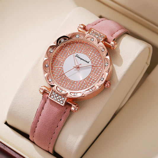 Korean-style quartz watch with a simple leather strap.